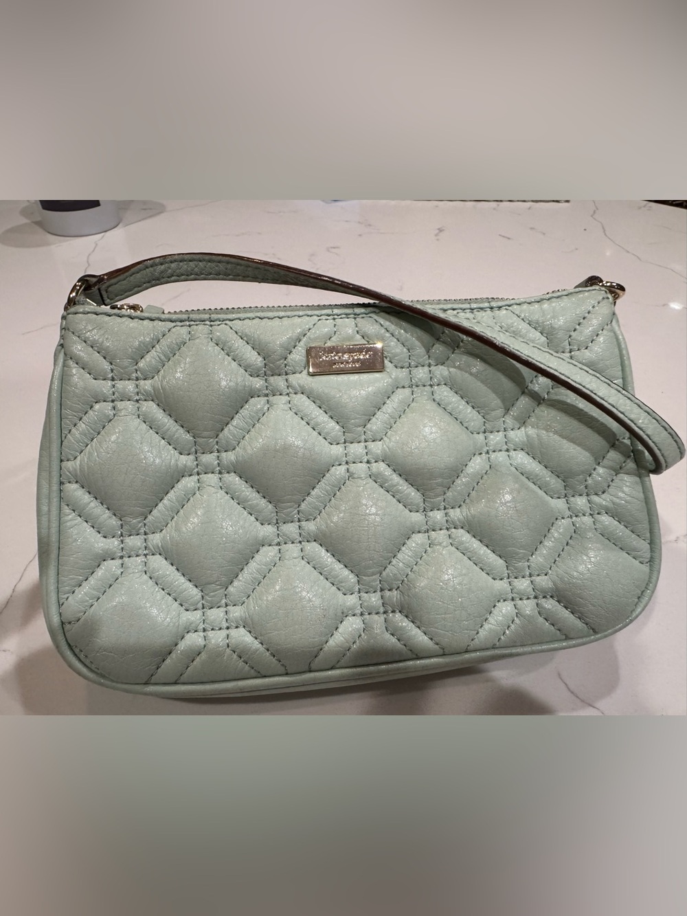 Kate Spade quilted leather wristlet in shimmer Mint green